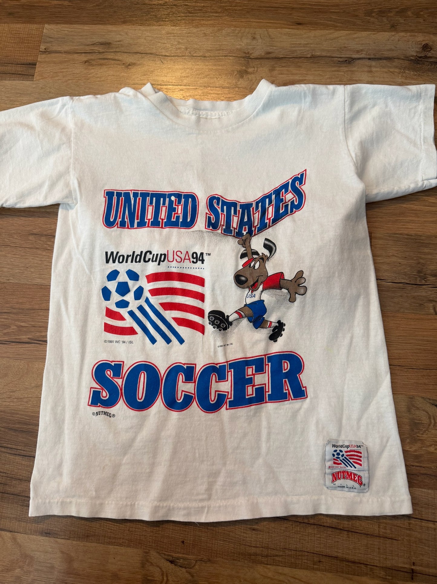 Striker 1994 FIFA World Cup Soccer Nutmeg Tshirt, Size Youth Small